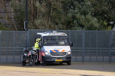 Police Van And Motor During A Football Match Of Ajax At Amsterdam The Netherlands 27-10-2024 clipart