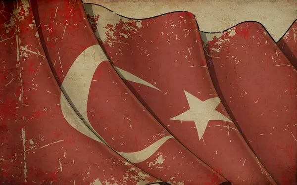 一张印有挥动的土耳其国旗的旧报纸的背景说明 — 图库照片