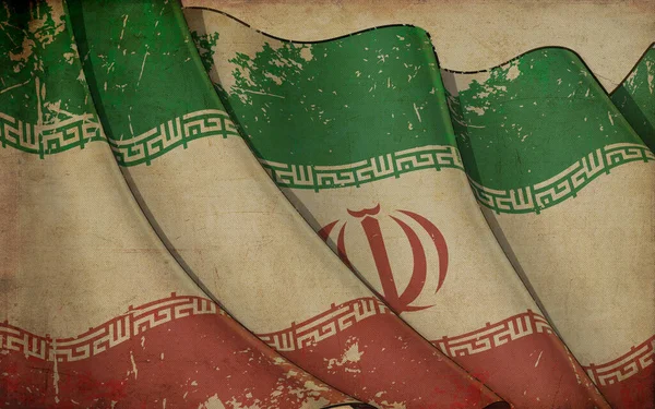 印有挥动的伊朗国旗的旧报纸的背景说明 — 图库照片#