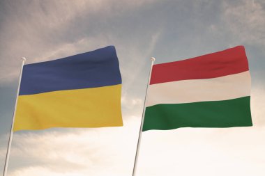 Ukrayna ve HUNGARY bayrakları bulutlu mavi gökyüzü arkaplanıyla dalgalanıyor, 3D ülkeleri arasındaki ilişkiler.