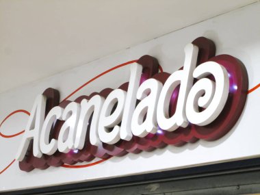 Acanelado Cinnamon restoranı yuvarlıyor. Editoryal illüstrasyon, editoryal. Caracas, Venezuela 16 Mayıs 2025. 
