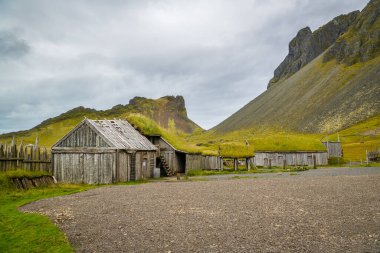 Hofn, Iceland - September 7, 2022: Old historic houses in viking village near Hofn in Iceland during September 2022 clipart