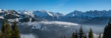 View on beutiful snowy peaks of Bernese Highlands in Swiss Alps clipart