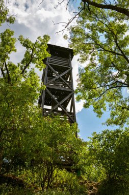 Nitrianska Blatnica, Slovakia - August 14, 2022: Outlook tower on top of Marhat peak near Nitrianska Blatnica in Slovakia during hot sunny day in August 2022 clipart