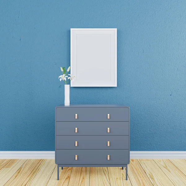 3d rendered illustration of a minimal blue wall room with blue cabinet and white mock up picture frame.