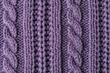Yünlü örgü deseninin yakın çekim görüntüsü.