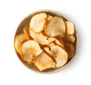 Dried apple slices in a rustic bowl, presenting a healthy fruit snack