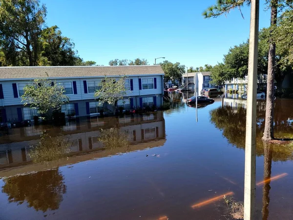 Hurricane Ian flooded houses in Orlando Florida UCF residential area. Natural disaster with totality lost. Building structure photo taken 9/30/2022