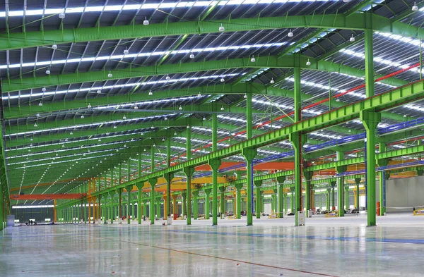 a newly built warehouse, an empty warehouse