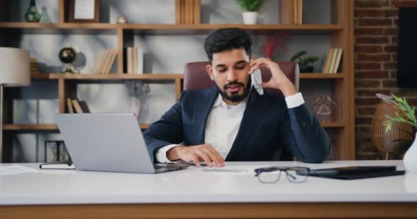 Handsome Busy Millennial Arabian Business Man Employee Using Laptop Talking — Stock Video