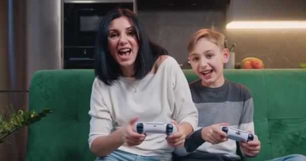 Young Smilling Woman Son Playing Video Game Together Moderm Kitchen — Stock video