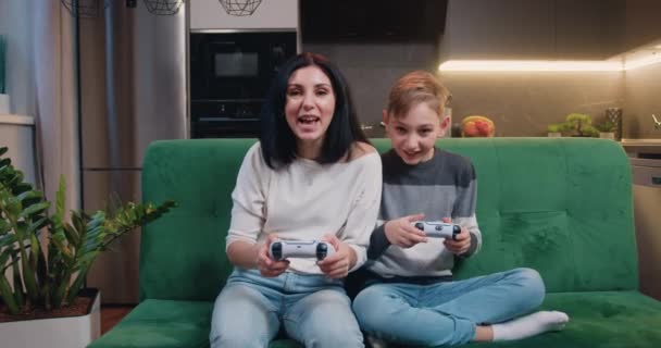 Mother Son Playing Video Game Using Controllers Spend Joint Leisure — Stock video