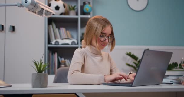 Smart Little Girl Sitting Desk Does Homework Her Room Schoolgirl — Vídeo de Stock