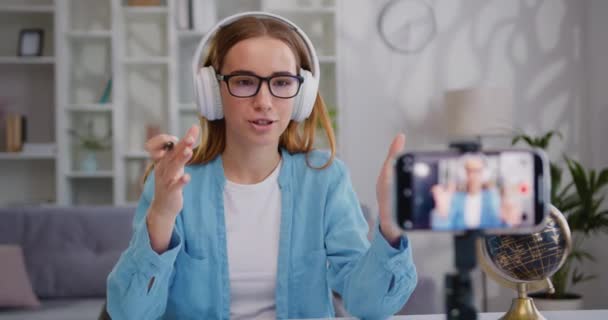 Female Influencer Blogger Attractive Young Girl Headphones Shooting Vlog Conducts — Stock Video
