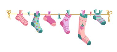 Çamaşır ipi çorapları. İpte çoraplar, vektör karikatürlü bebek çorapları.