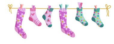 Çamaşır ipi çorapları. İpte çoraplar, vektör karikatürlü bebek çorapları.