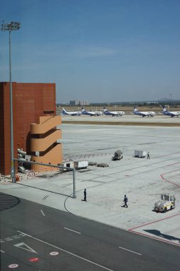 Karnataka, India - 15 April 2024: GO Air planes parked at Kempegowda International airport Bangalore, Karnataka clipart