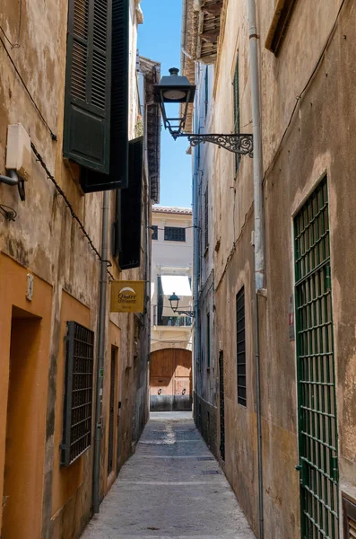 stock image Palma de Mallorca, Spain - 2022 05 21: Traditional Narrow street in the old town of Palma de Mallorca, Spain