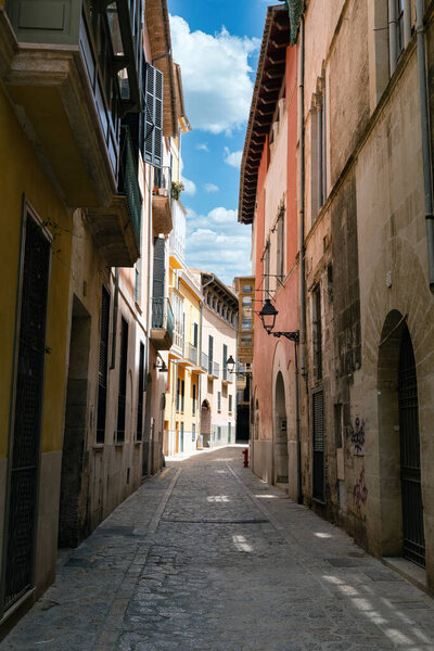 Traditional Narrow street in the old town of Palma de Mallorca, Spain
