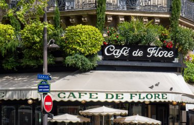 Paris, France - April 25 2024: The Cafe De Flore located at the corner of boulevard Saint Germain and rue Saint Benoit. clipart