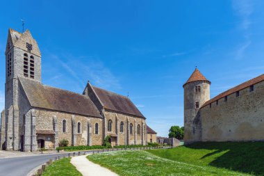 Castle of Blandy les Tours in the Seine-et-Marne department near Paris, France. View of the North and Blandy Church. clipart