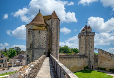 Castle of Blandy les Tours in the Seine-et-Marne department near Paris, France. View of the rampart walk, the Archives tower and the Keep tower. clipart
