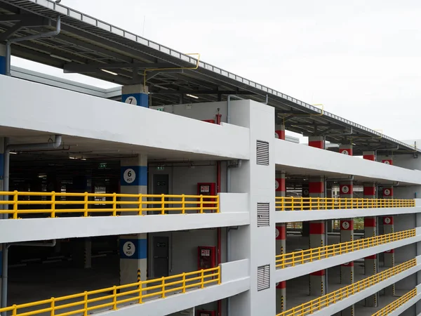 stock image Multi-level parking garage. Indoor car park building. Urban parking structure. Multistory car park. Concrete parking garage. Vehicle parking facility. Building construction. Modern architecture.