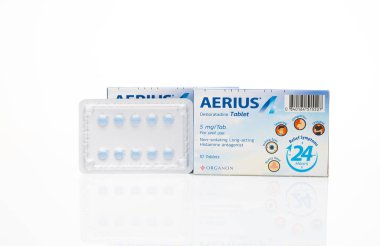 CHONBURI, THAILAND-MAY 3, 2023: Aerius with packaging on white. Desloratadine tablets pill. Product of Organon. Antihistamine medicine for relieve allergic rhinitis and urticaria. Prescription drugs.