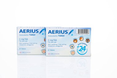 CHONBURI, THAILAND-MAY 3, 2023: Aerius with packaging on white. Desloratadine tablets pill. Product of Organon. Antihistamine medicine for relieve allergic rhinitis and urticaria. Prescription drugs.