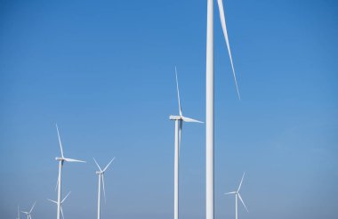Wind energy. Wind power. Sustainable, renewable energy. Wind turbines generate electricity. Wind farm. Sustainable resources. Sustainable development. Green technology for energy sustainability. clipart