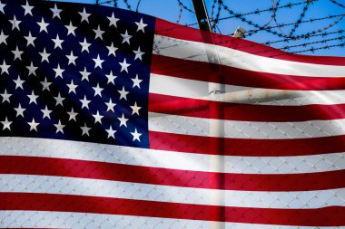 US border wall policy. Prevent illegal immigration and enhance security. National defense. American flag and barbed wire fence. Protection and control. Combat drug trafficking and protect sovereignty. clipart