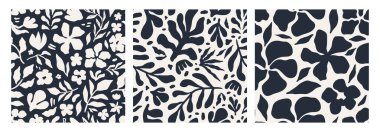 Açık krem arka planda soyut siyah çiçekli kusursuz desenler oluşturuldu. Modern minimalist tasarım kumaş, ambalaj, duvar kağıtları, arka plan, kırtasiye ve yaz dekorasyonu için mükemmeldir.