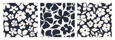 Siyah ve krem rengi kalın çiçekli ve botanik siluetleri içeren soyut, dikişsiz desenler. El çizimi modern tasarım tekstil, ambalaj, duvar kağıdı ve dijital projeler için mükemmeldir..