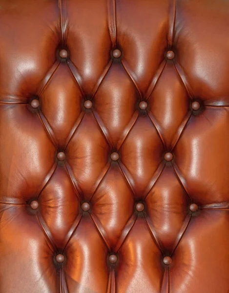 家具業界で使用されている茶色の革素材の張りパターンの背景 — ストック写真