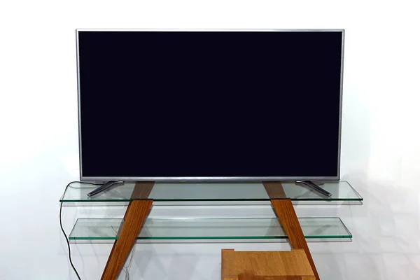 Televisão Grande Com Tela Vazia Branco Mesa Vidro Dentro Interior — Fotografia de Stock