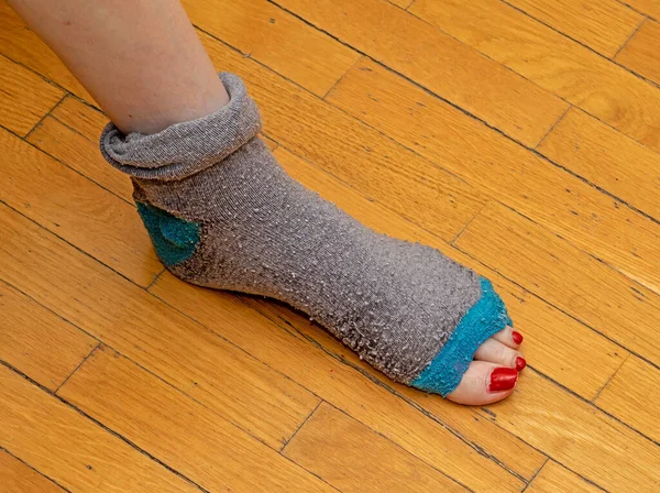 Old Tacky Sock Completely Torn Apart Foot Toes Peeking Out — Stock Photo, Image