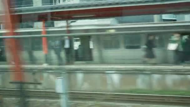 View Out Window Train Commuter Car While Moving Platform Station — Wideo stockowe