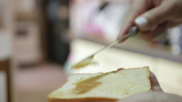 Closeup Video Spread Fresh Butter Toasted Sliced Bread Breakfast Healthy — стоковое видео