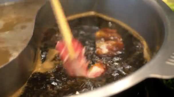 Close Hotpot Shabu Vegetale While Using Chopsticks Putting Meat Beef — Vídeo de Stock