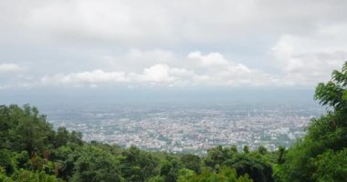 timelapse View of chiang mai town from the sky through the cloudy sky in winter time