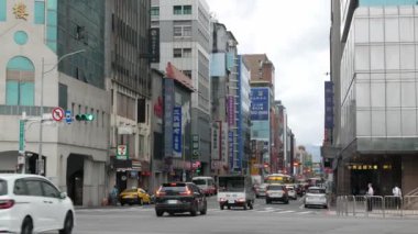 July25,2023.Taipei,Taiwan.street road view in the city of Taipei with many traffic on the road under sunny daytime in old Taipei city area