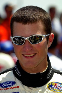 Kasey Kahne enjoys a few laughs with his fellow competitors before the start of the GNC Live Well 250 NASCAR Busch Grand National race at the Milwaukee Mile in West Allis, Wisconsin.