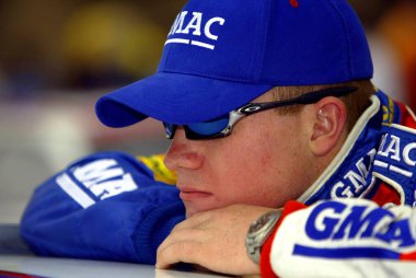 April 25, 2003 - Fontana, CA, : Brian Vickers ponders before going out to qualify at the California Speedway in Fontana, California for the running of the CaliforniaSpeedway.com 300 NASCAR Busch Grand National race.
