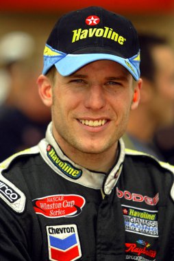 April 25, 2003 - Fontana, CA, : Jamie McMurray enjoys a smile before going out to qualify at the California Speedway in Fontana, California for the running of the Auto Club 500 NASCAR Winston Cup race.