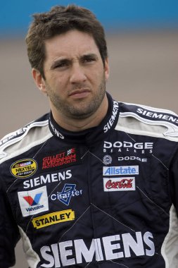 February 11, 2001 - Phoenix, AZ, USA: Elliot Sadler waits to qualify at Phoenix International Raceway for the running of the NASCAR Nextel Cup Checker Auto Parts 500 race in Phoenix, AZ.
