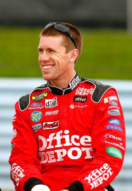 August 10, 2007 - Watkins Glen, NY, USA: Carl Edwards sits on the wall along pit road as he waits for the mist to subside at Watkins Glen.