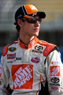 09 October, 2009:   Joey Logano watches qualifying for the Pepsi 500 race at the Auto Club Speedway in Fontana, CA.