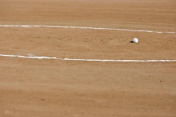 Little league pitchers mound with a baseball
