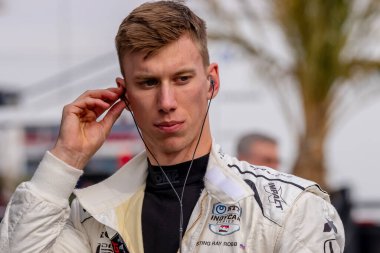 STING RAY ROBB (51) (R) of Payette, Idaho prepares to practice for The Thermal Club Open Test at The Thermal Club in Thermal CA.