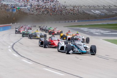 Tokyo, Japonya 'dan TAKUMA SATO (11), Ft Worth TX' teki Texas Motor Pisti 'nde PPG 375 sırasında virajlarda yarışıyor..